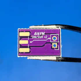 Assembled SMA to Whatever PCB.